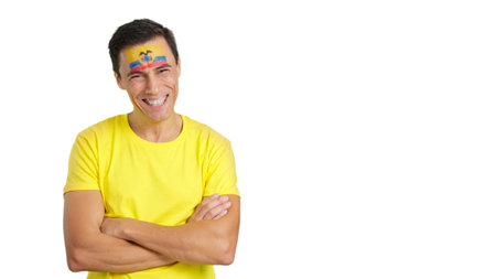 Man standing with ecuadorian flag painted on face smilingの写真素材