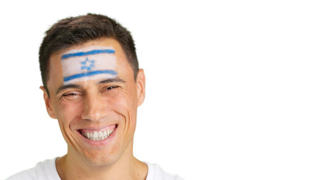 Man with a israeli flag painted on the face smilingの写真素材