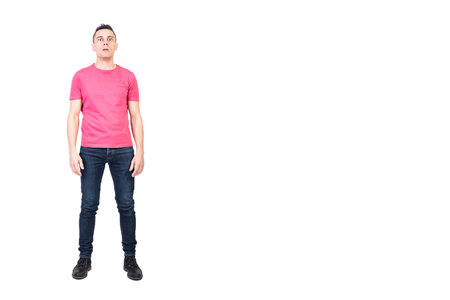 Shocked man looking at camera. White background