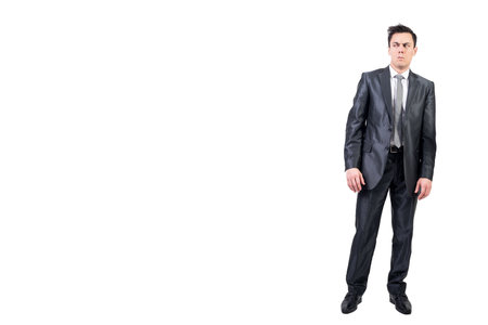 Suspicious man in formal suit. White background.の写真素材