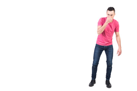 Man plugging nose from bad smell. White backgroundの写真素材