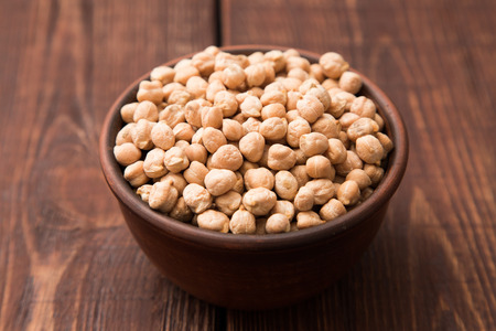 Chickpeas biological on dark backgroundの写真素材