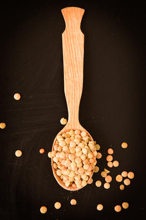 Dry green lentils close up. Top viewの写真素材