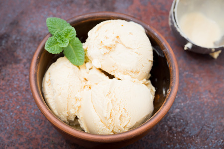 caramel ice cream with mintの写真素材