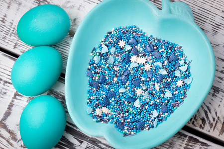 Easter eggs and decor on light backgroundの写真素材