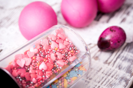 Easter eggs and decor on light backgroundの写真素材