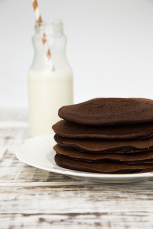 Chocolate pancake on a light background.の写真素材