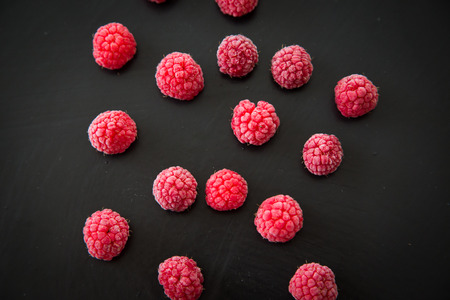 Frozen berries on dark backgroundの写真素材