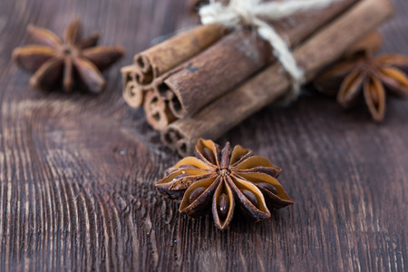 cinnamon and star anise on a wooden background . close-up.の写真素材