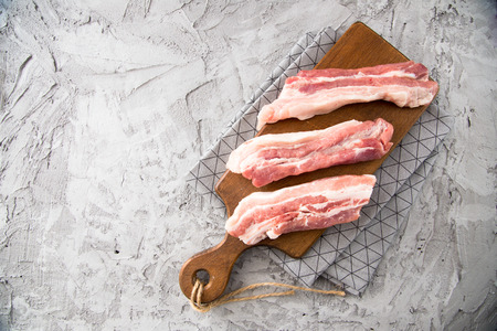 Raw meat. Pork ribs with herbs and spicesの写真素材