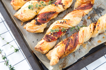 Bacon sticks pastry with black sesame and thyme.