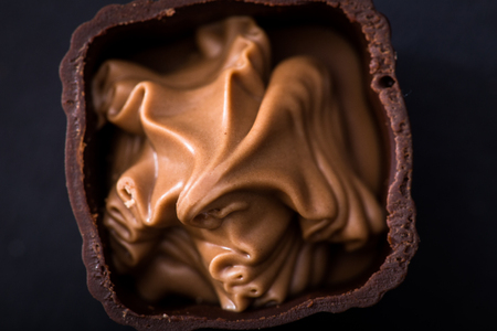 Different kinds of chocolates close-up. various chocolate pralines.の写真素材