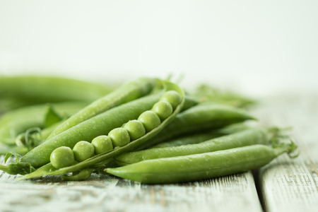 green pea pod, green peas. Vegetable background.の写真素材