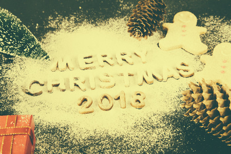 Card with Gingerbread Cookies. Baked Letters Merry Christmas, Fir Tree. Christmas card.の写真素材