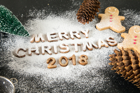 Card with Gingerbread Cookies. Baked Letters Merry Christmas, Fir Tree. Christmas card.