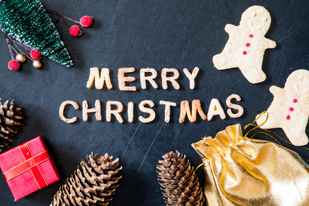 Card with Gingerbread Cookies. Baked Letters Merry Christmas, Fir Tree. Christmas card.の写真素材