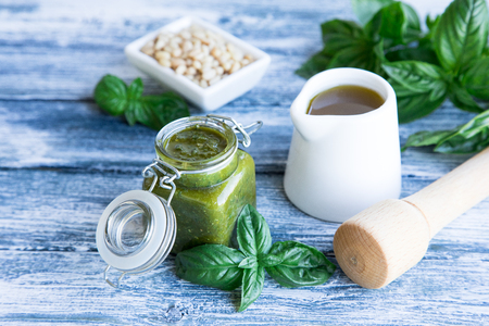 pesto sauce with raw ingredients. Basil pesto sauce.の写真素材