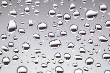 Rain drops on the glass, background. water drop background texture.の写真素材