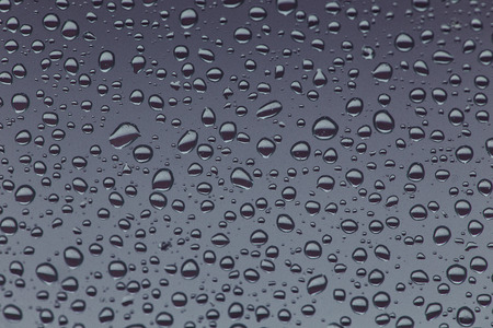 Rain drops on the glass, background. water drop background texture.の写真素材