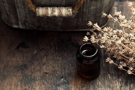 Essential oils and lavender on wooden table. lavender spa, Wellness with lavender.の写真素材