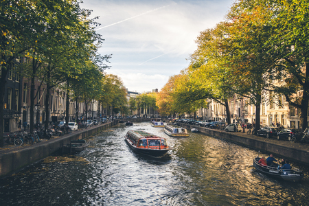 Typical view of canal embankment in historic center of city, Amsterdam, Netherlandsのeditorial素材