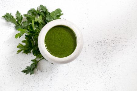 Homemade parsley pesto sauce and ingredients. Vegan healthy foodの写真素材