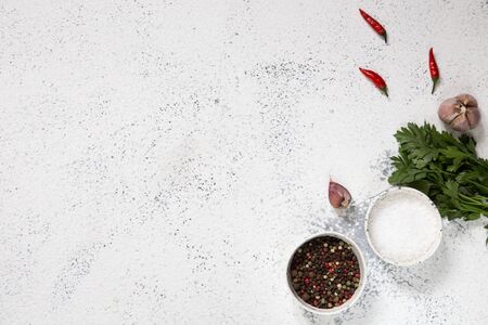 Spices, Herbs for cooking on white concrete backdrop. Top view with copy space for text. Menu, recipe mock up, banner background/の写真素材