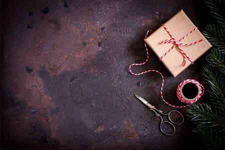 Christmas or New Year present. Vintage gift box on a dark background. Top view with copy spaceの写真素材