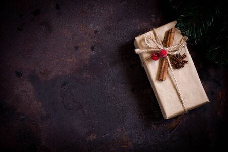 Christmas or New Year present. Vintage gift box on a dark background. Top view with copy spaceの写真素材