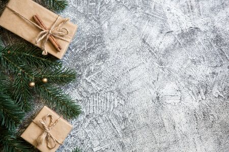 Christmas composition with gift boxes and fir branches. greeting card/の写真素材
