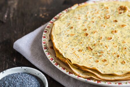 poppy seed crepes (blinis). pancakes with poppy seedsの写真素材