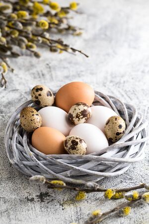 natural fresh eggs in a wreath. spring or easter background with place for text.の写真素材