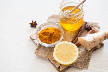ingredients for Turmeric tea drinks for beauty and health. Spicy healthy Haldiの写真素材