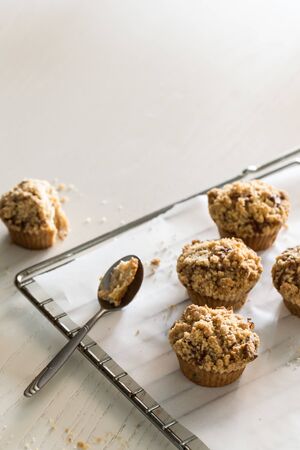 apple and cinnamon crumble muffins. homemade apple cupcakeの写真素材
