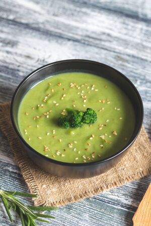 Spring detox Broccoli cream soup with sesame seeds and breadcrumbs. Clean eating, dieting, vegan, vegetarian, healthy food concept.の写真素材