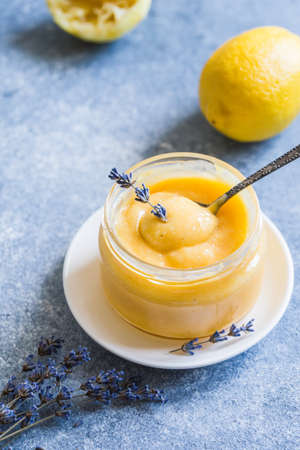 homemade lemon curd in a jar. delicious lemon cream or jam for a healthy snack.