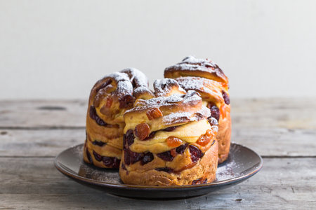Panetone kulich craffin on wooden background. Easter bread kozunak. copy space concept.の写真素材