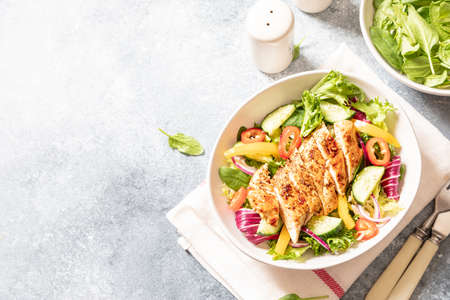 Grilled Chicken fillet with salad. Healthy food, keto diet, diet lunch conceptの写真素材