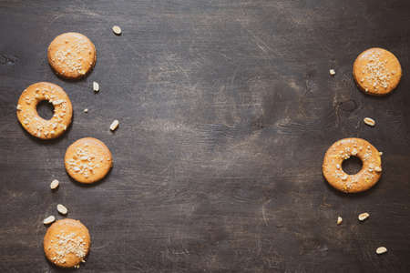 homemade shortbread cookies with peanuts on a wooden background. peanut cookie. flat lay, place for text, food background.の写真素材