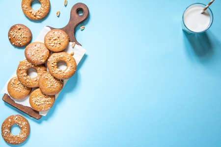 homemade shortbread cookies with peanuts on a trendy blue background. peanut cookie. flat lay, place for text, food background.の写真素材