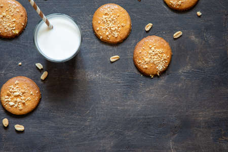 homemade shortbread cookies with peanuts on a wooden background. peanut cookie. flat lay, place for text, food background.の写真素材