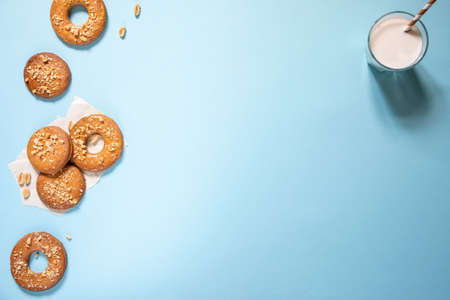 homemade shortbread cookies with peanuts on a trendy blue background. peanut cookie. flat lay, place for text, food background.の写真素材