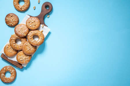 homemade shortbread cookies with peanuts on a trendy blue background. peanut cookie. flat lay, place for text, food background.の写真素材