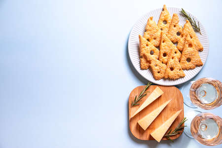 Parmesan savory cookies with rosemary. Salty cheese cookies. Healthy snack. background image. top view, copy space, flat lay.の写真素材