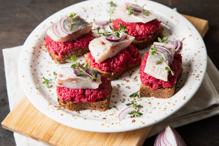 herring appetizer. Herring with beets on rye bread. Brain food concept. Home cooking.の写真素材