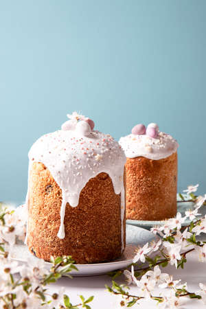 Easter cake with glace icing and decoration. Postcard with Easter bread. Christian tradition....