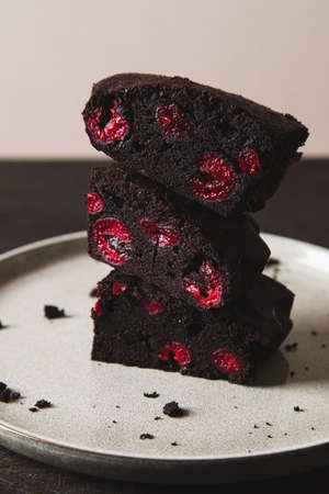 brownie with cherry. A stack of chocolate brownies, homemade bakery and dessert. Bakery, confectionery conceptの写真素材