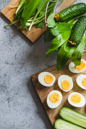 Ingredients for a healthy salad - leeks, boiled eggs, cucumber. concept of healthy eating and keto...