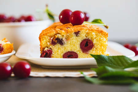 delicious sweet cake with cherries and a fresh cherry on the side. cherry-pie.の写真素材