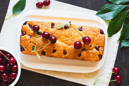 delicious sweet cake with cherries and a fresh cherry on the side. cherry-pie.の写真素材
